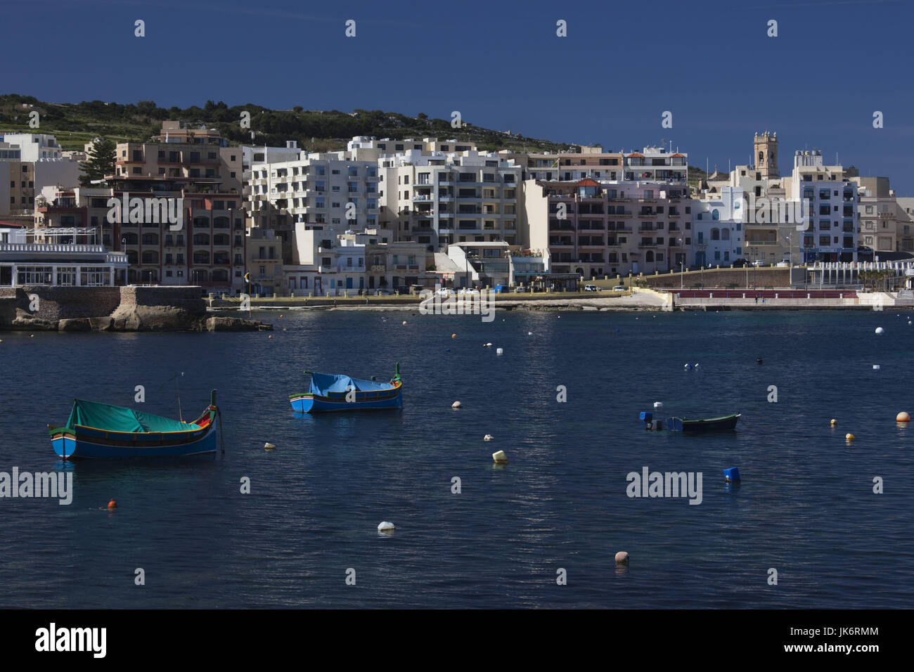 Malta, St. Paul's Bay area, Bugibba, town waterfront with view towards Xemxija Stock Photo