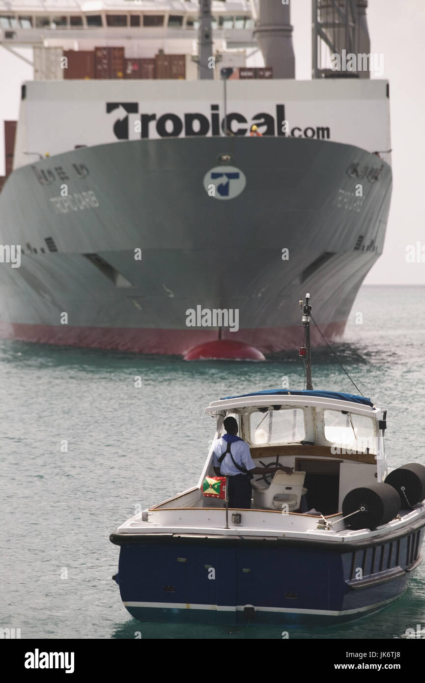 Grenada, St. George's, Hafen, Containerschiff, Detail, Lotsenschiff  Karibik, Westindische Inseln,  Inseln über dem Winde, Insel, Innere Hafen, Carenage, Schiff, Frachter, Frachtschiff, Transport, Container, Ladung, Wirtschaft, Logistik, Fracht, Cargo, Schifffahrt, Lotse, Bugsierschiff, Bugsierschlepper Stock Photo