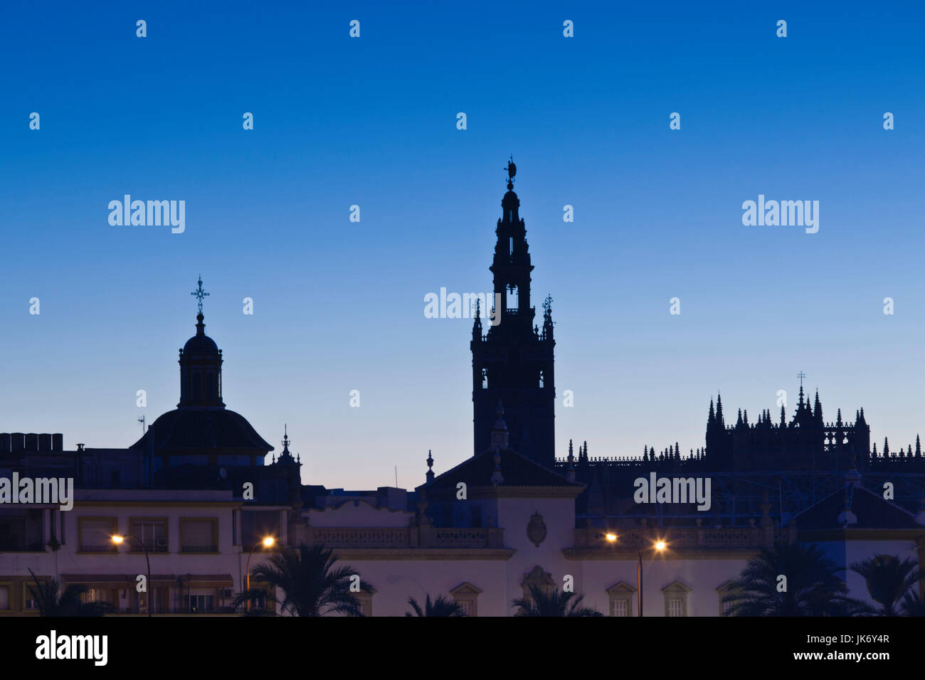 Spain, Andalucia Region, Seville Province, Seville, Giralda tower from the Rio Guadalquivir river, dawn Stock Photo