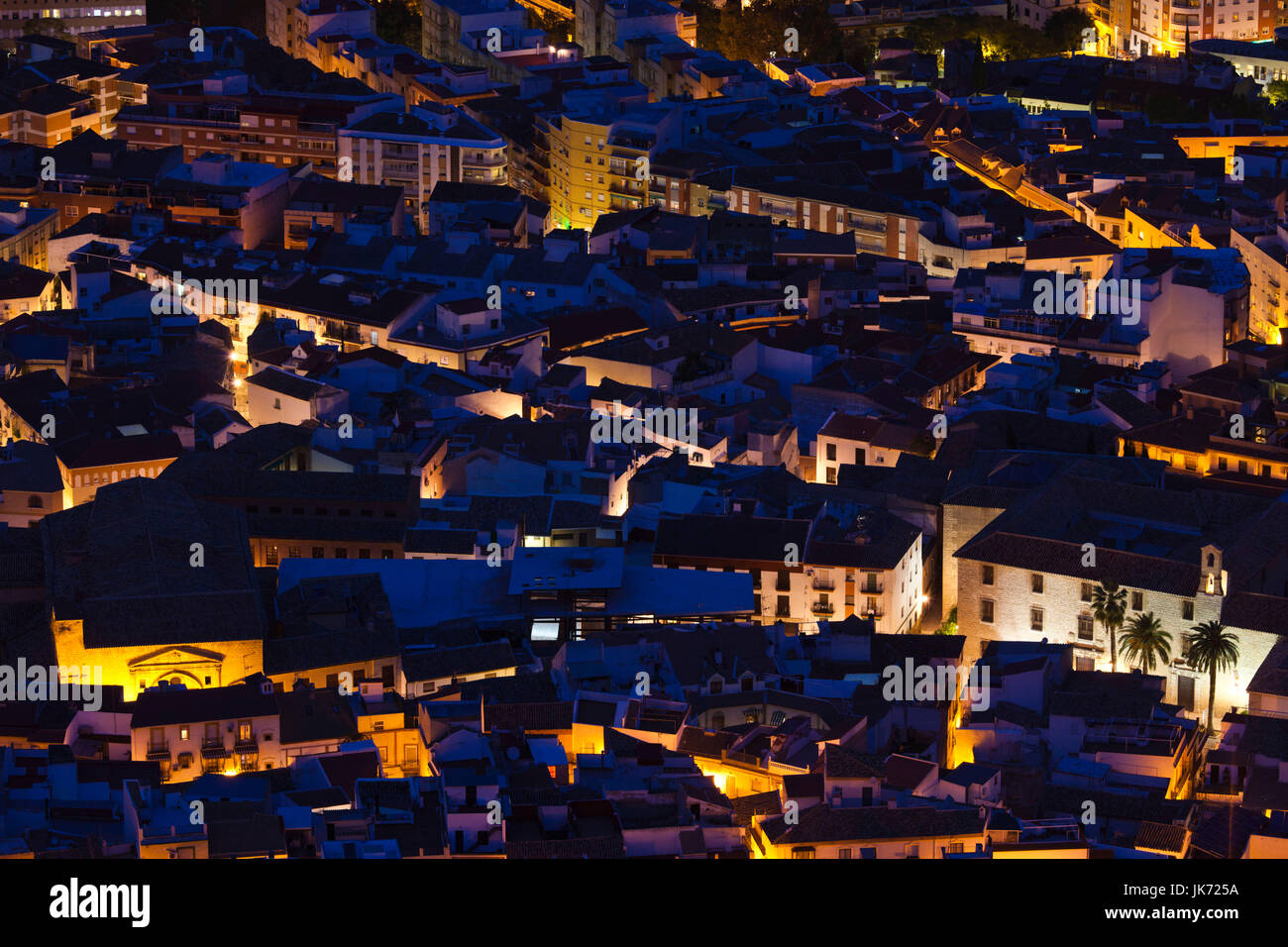 Spain, Andalucia Region, Jaen Province, Jaen, elevated city view from the Cerro de Santa Catalina hill, evening Stock Photo