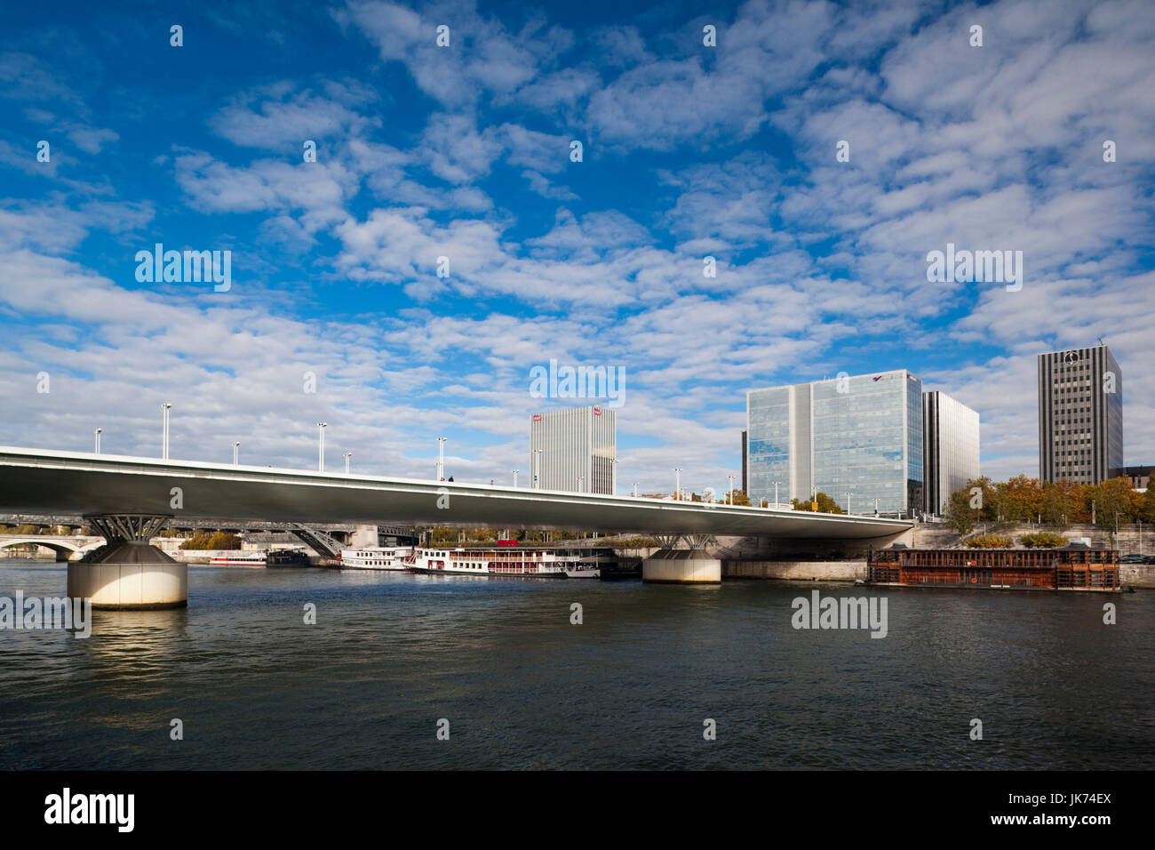 France, Paris, Seine River, buildings on the Quai de la Rapee, and the Pont Charles De Gaulle bridge Stock Photo