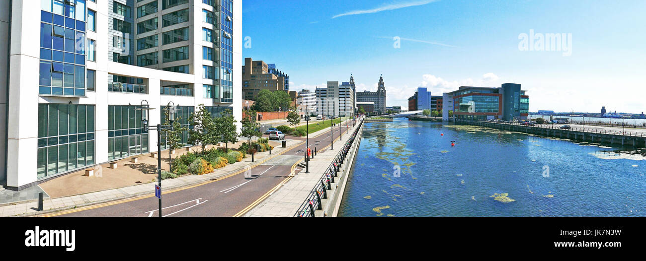 Panoramic view of modern offices and hotels on William Jessop Way(left) and Princes Dock with the Liver Building at centre,Liverpool,UK Stock Photo