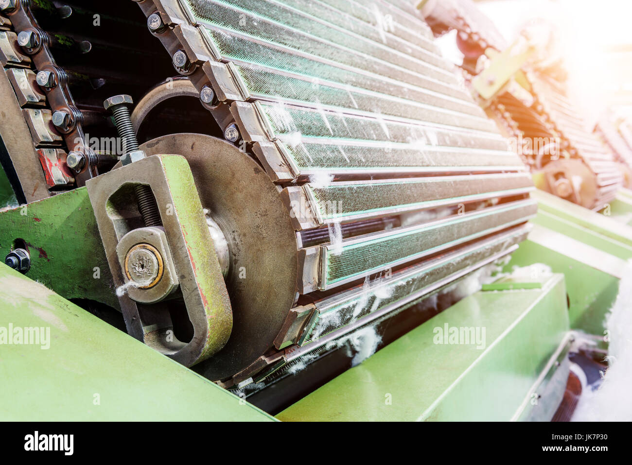 Features of carding machine in textile mill Stock Photo - Alamy
