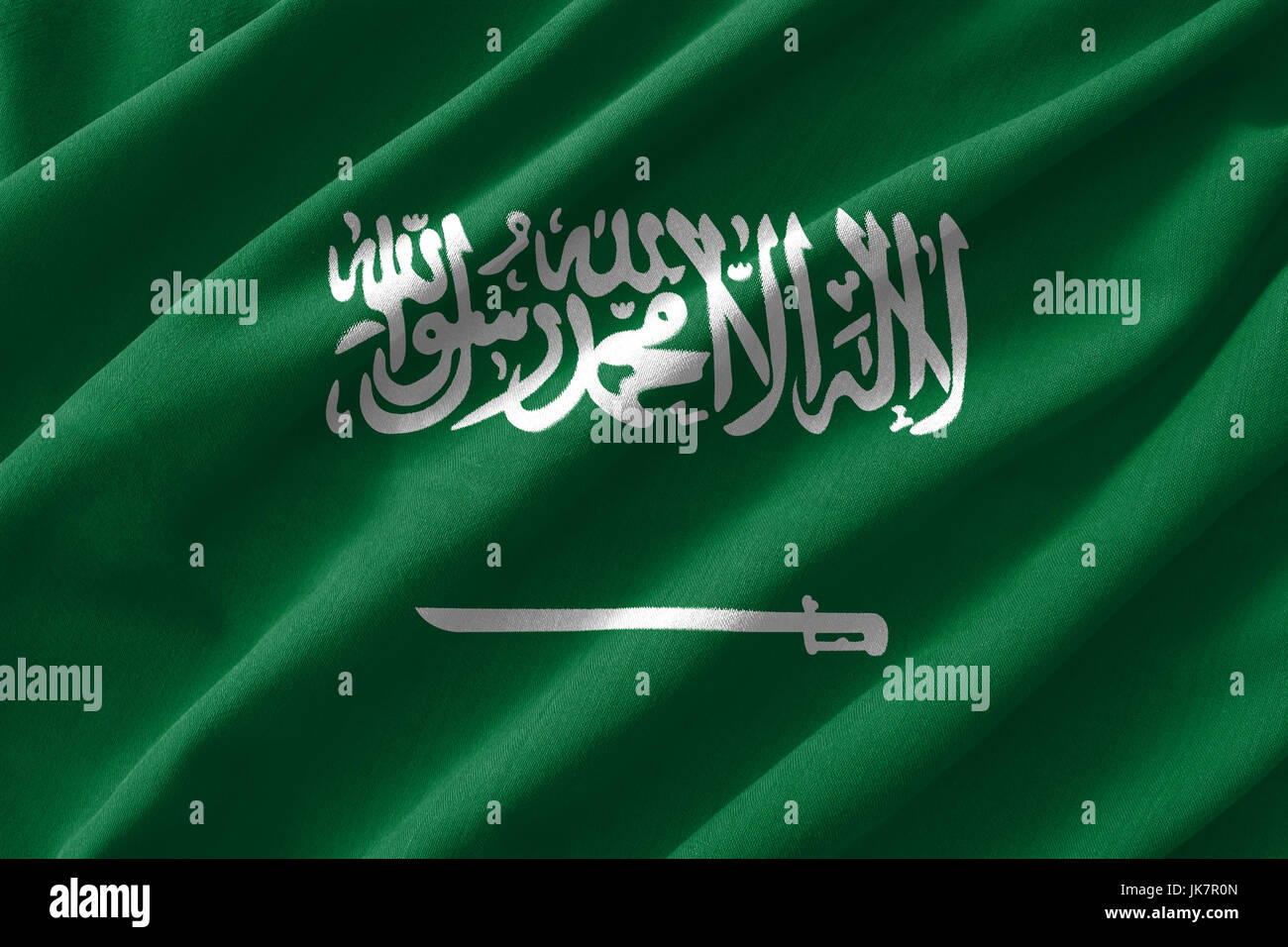 Saudi Arabia flag painting on high detail of wave cotton fabrics . 3D illustration . Stock Photo