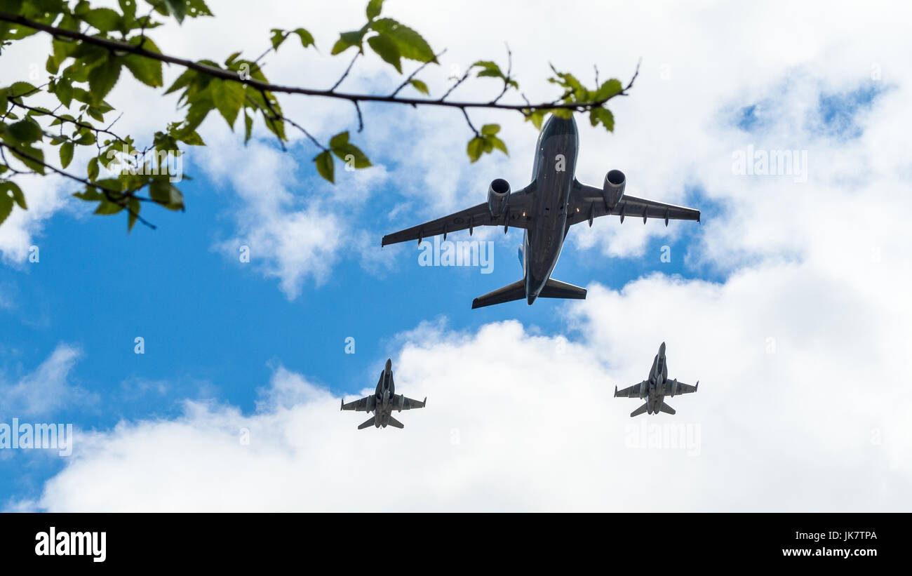 Airbus CC-150 Polaris and McDonnell Douglas CF-18 Hornet of Royal Canadian Air Force fly over Ottawa, Capital of Canada on Canada Day (July 1) Stock Photo