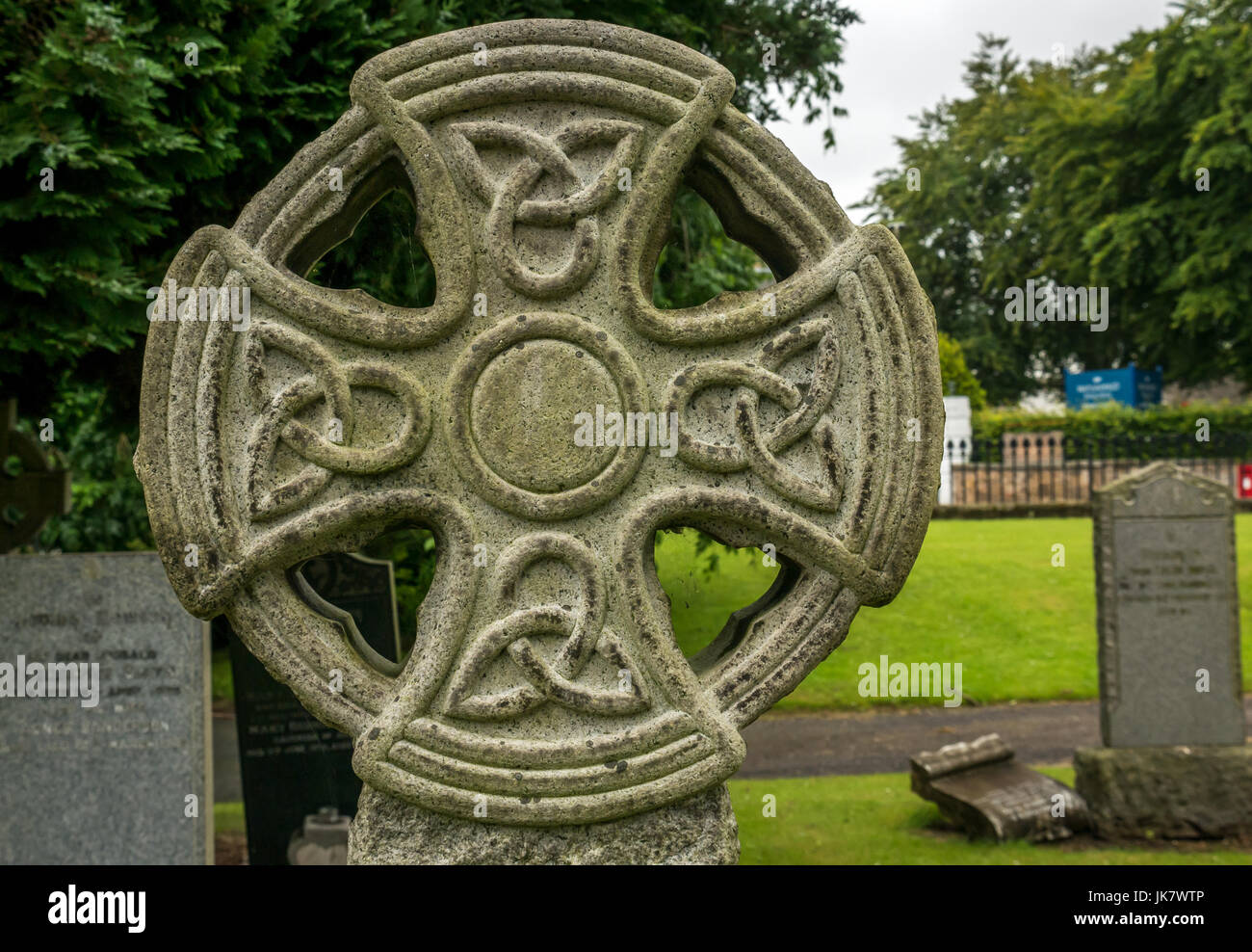 Close up of celtic style cross on gravestone in churchyard, St Mary's Collegiate Church, Haddington, East Lothian, Scotland, UK Stock Photo