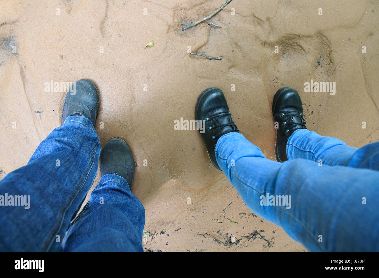 Schuh Fuß Spuren, Abdruck im Sand, im Schlick, Morast Stock Photo