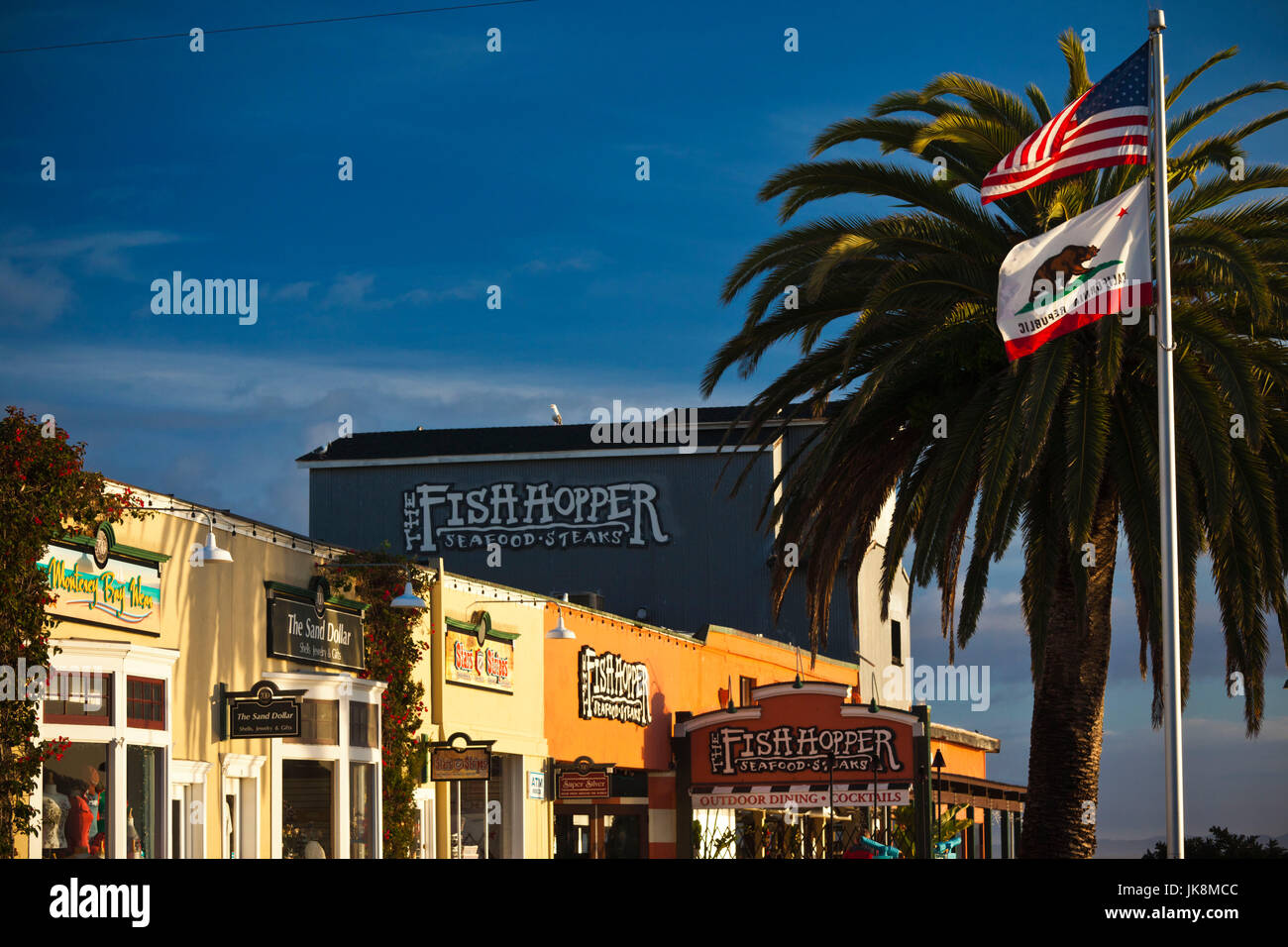 USA, California, Central Coast, Monterey, Cannery Row area, pier shops and restaurants, morning