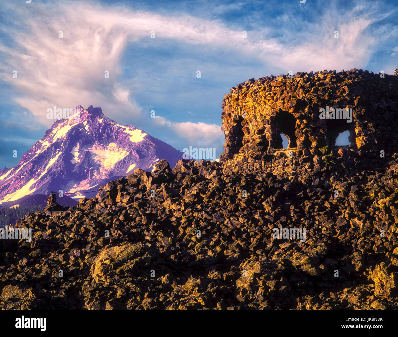 Dee Wright Observatory and South Sister Mountain. McKenzie Pass, Oregon Stock Photo