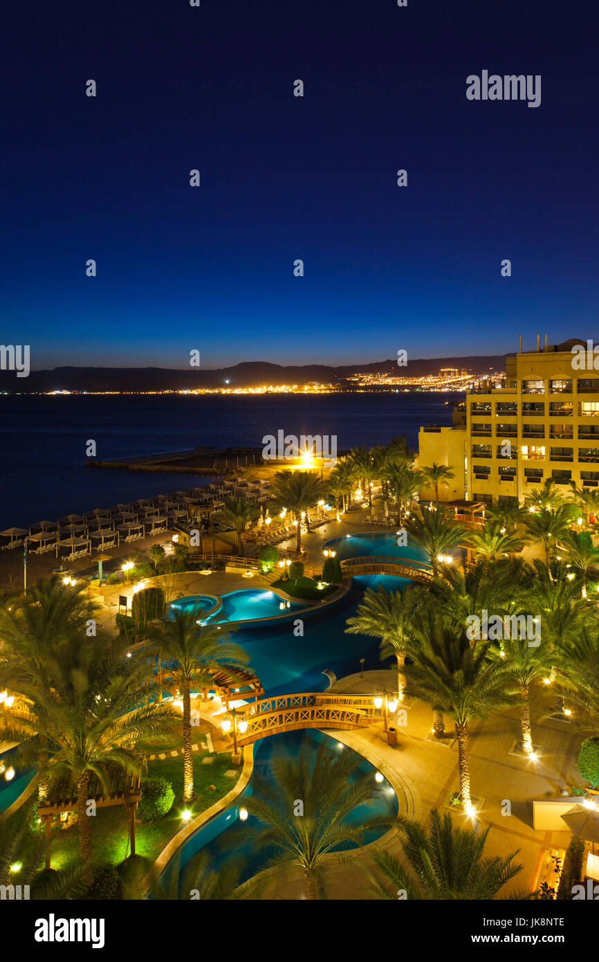 Jordan, Aqaba, elevated view of the Red Sea and Intercontinental Hotel, dusk Stock Photo