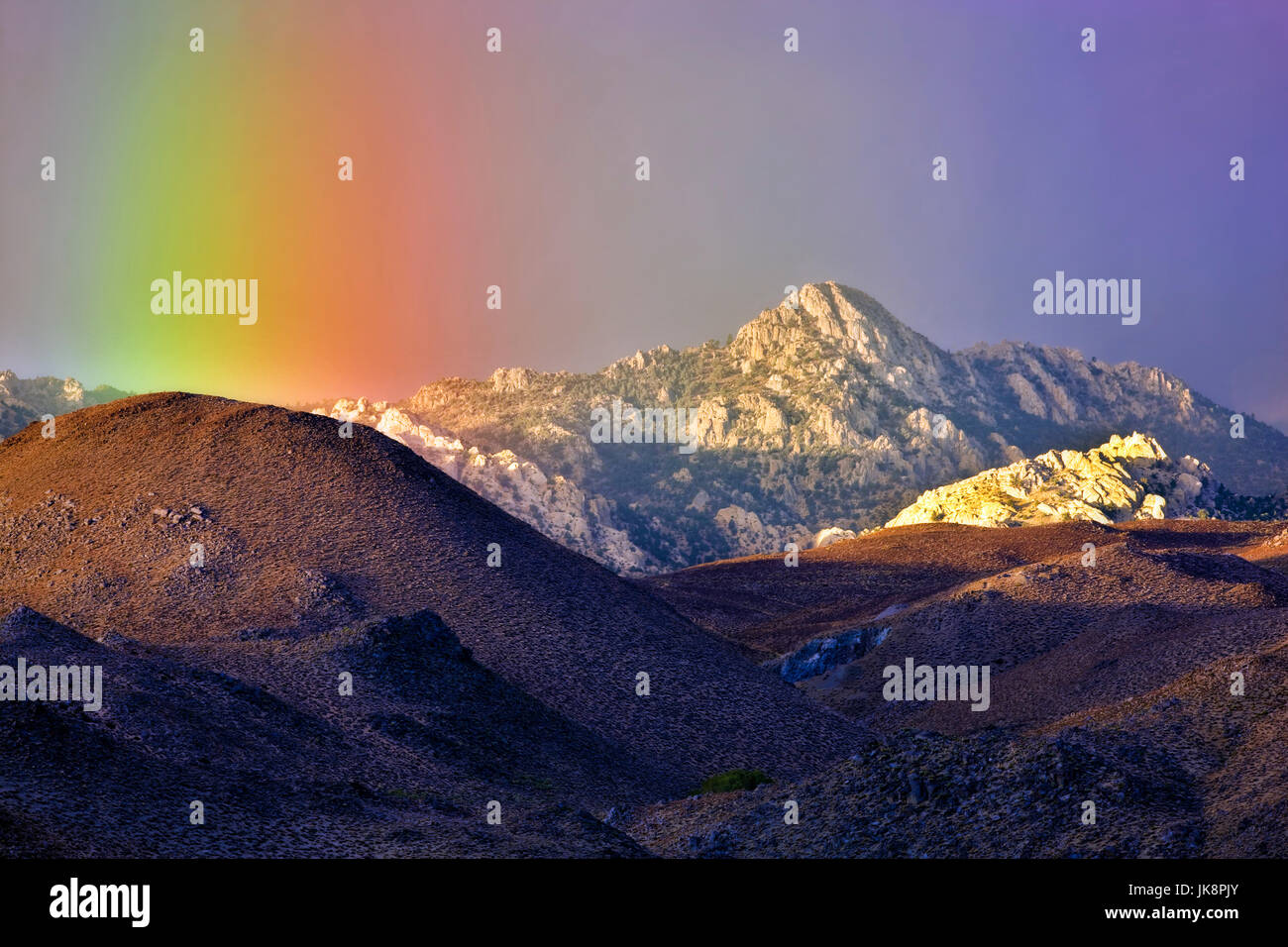Rainbow over Eastern Sierra Mountains near Bishop, California Stock Photo