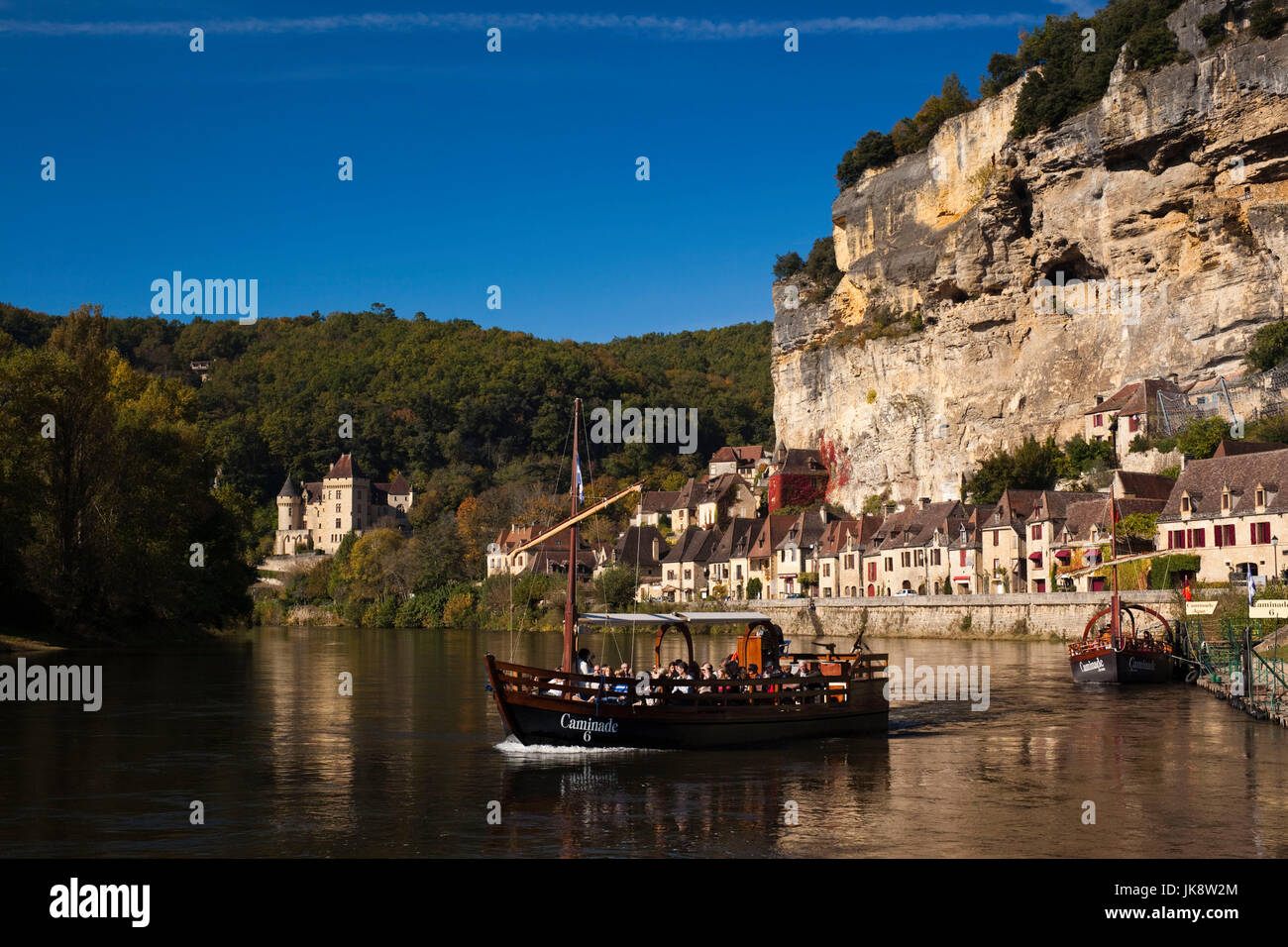 France, Aquitaine Region, Dordogne Department, La Roque Gageac, town on the Dordogne River and tour boats Stock Photo