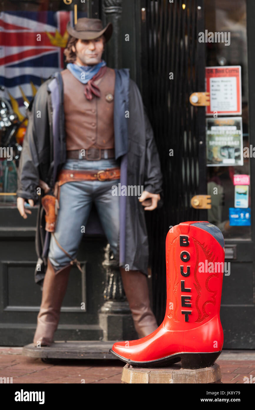 Canada, British Columbia, Vancouver, Gastown, boot and cowboy statue Stock Photo
