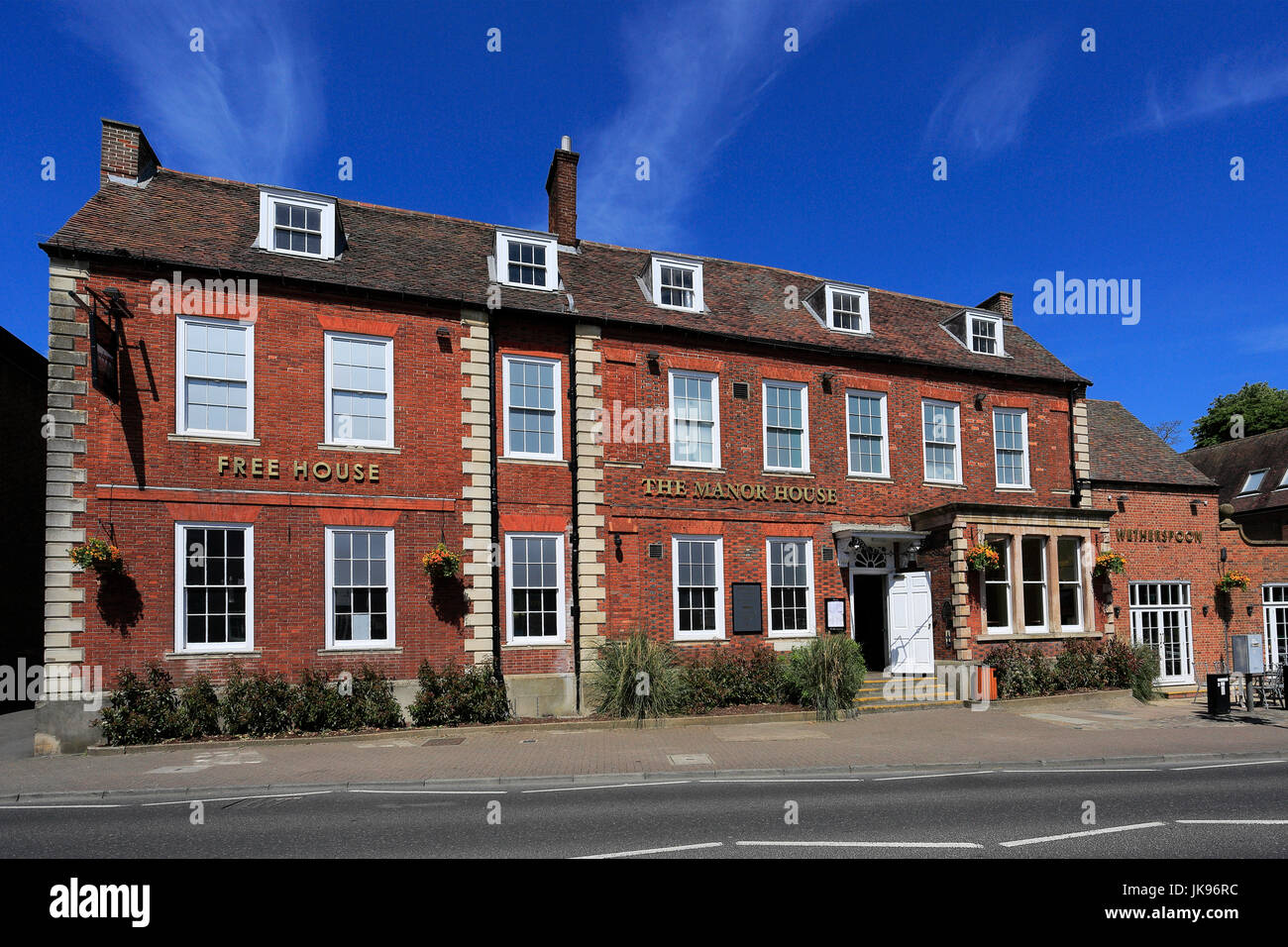 Summer view of the Manor House Pub, Royston town centre, Hertfordshire