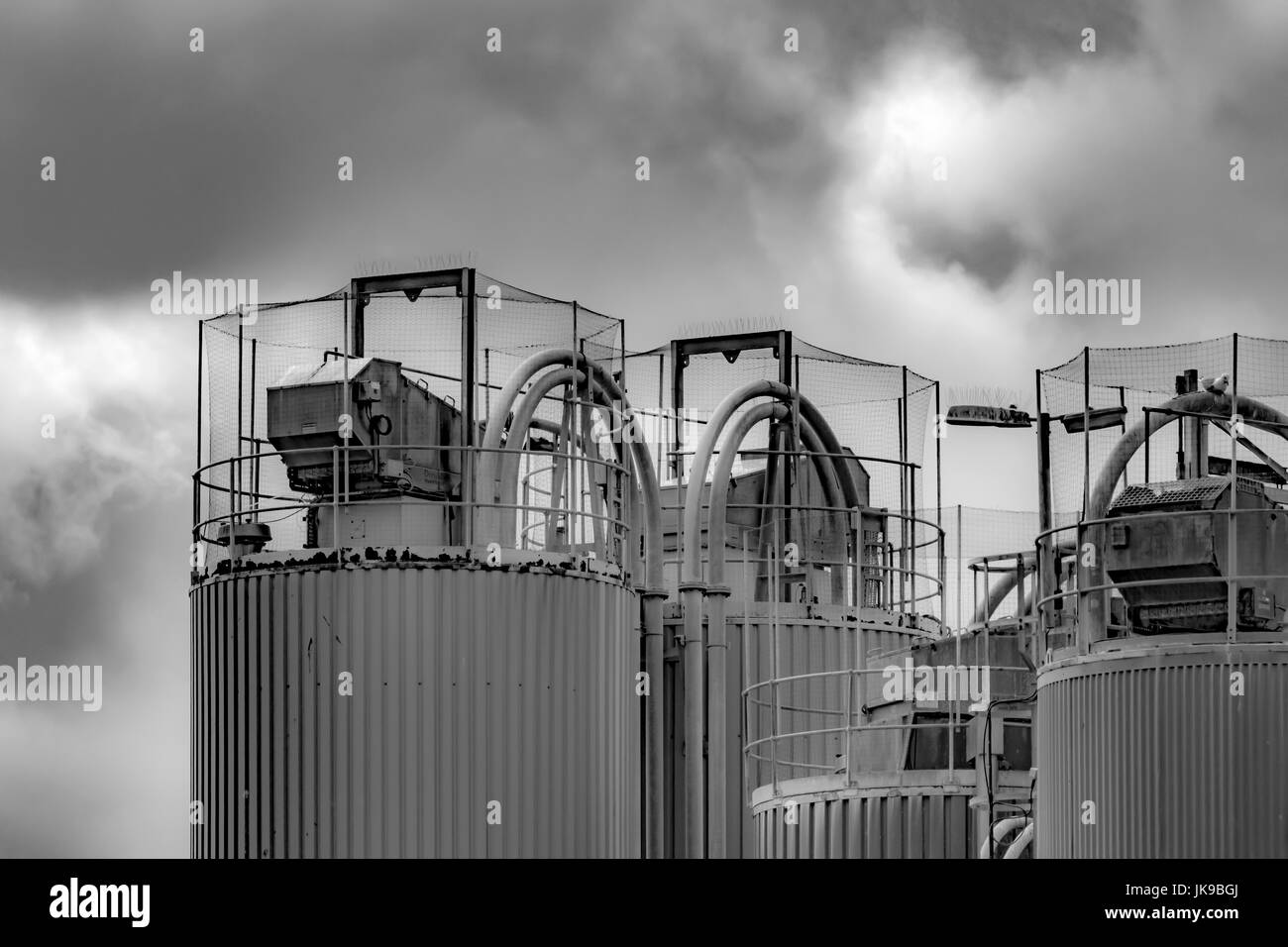 Black and white image of Industrial architecture at a china clay drying plant at Par beach, Cornwall. Stock Photo