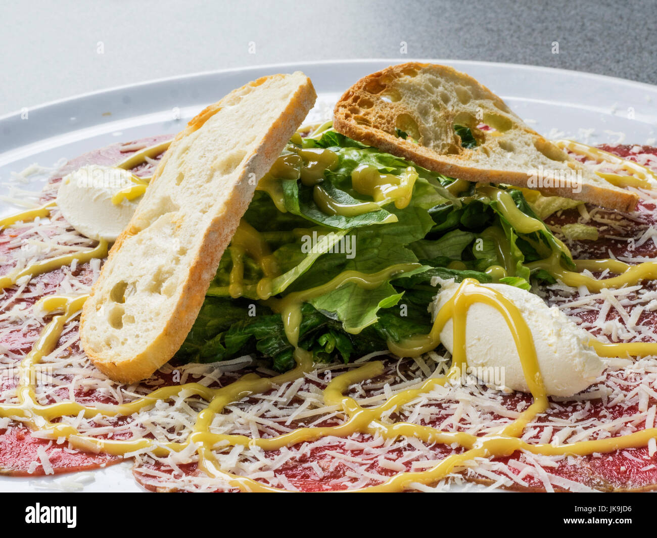 Beef carpaccio with truffle cheese Stock Photo Alamy