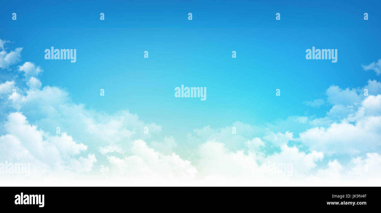 Early blue sky background, sunny light through white clouds Stock Photo