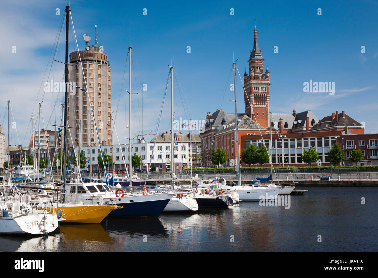 France, Nord-Pas de Calais Region, Nord Department, French Flanders Area, Dunkerque, Bassin du Commerce marina and town hall tower Stock Photo