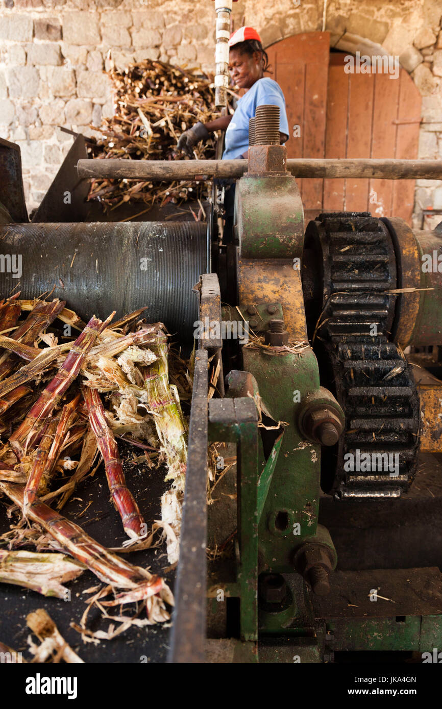 Dominica, Salisbury, Macoucherie Rum Distillery, sugar cane crushing, NR Stock Photo