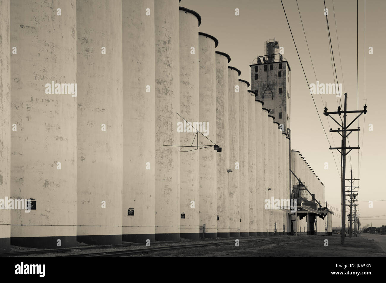 USA, Kansas, Hutchinson, grain elevator, dusk Stock Photo Alamy