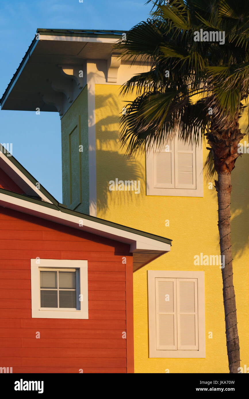 USA, Florida, Gulf Coast, Fort Myers Beach, pastel buildings and palm