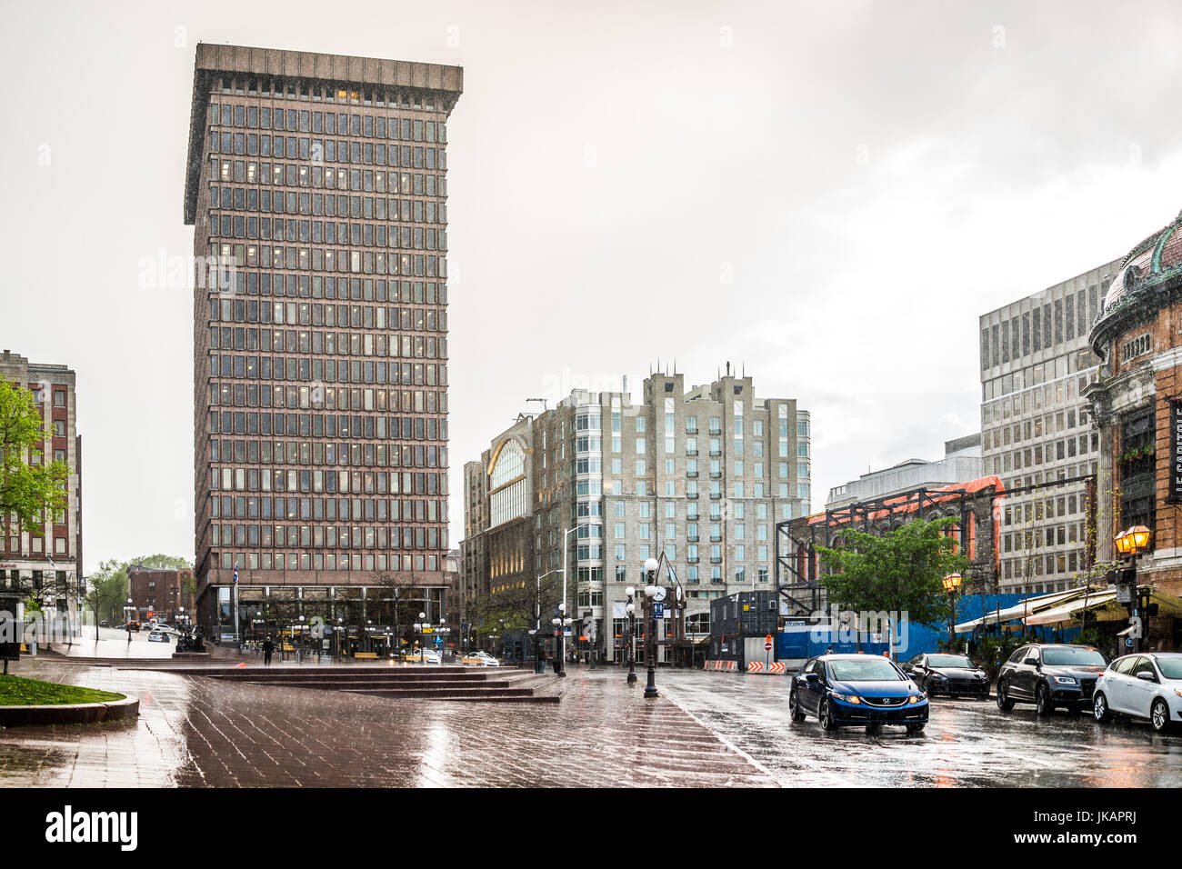 Quebec City, Canada - May 31, 2017: Place D'Youville during heavy rain ...