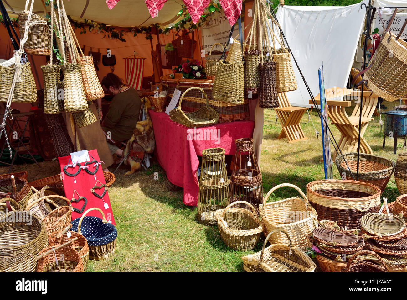 Craft stall selling traditional willow woven baskets at Tewkesbury Medieval Festival Stock Photo