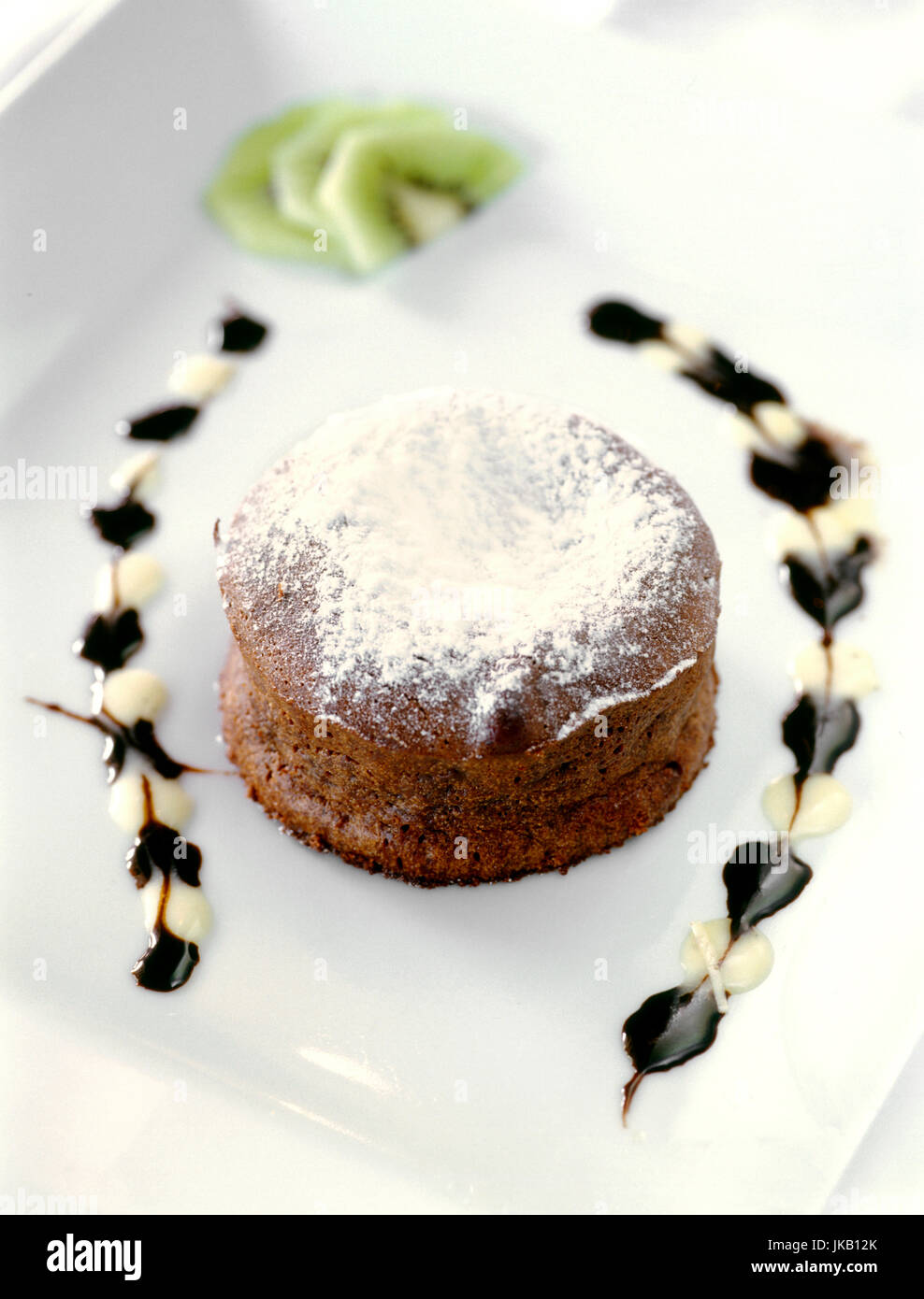 Chocolate fondant with kiwi fruit dessert. Cap Est, Martinique. Eastern