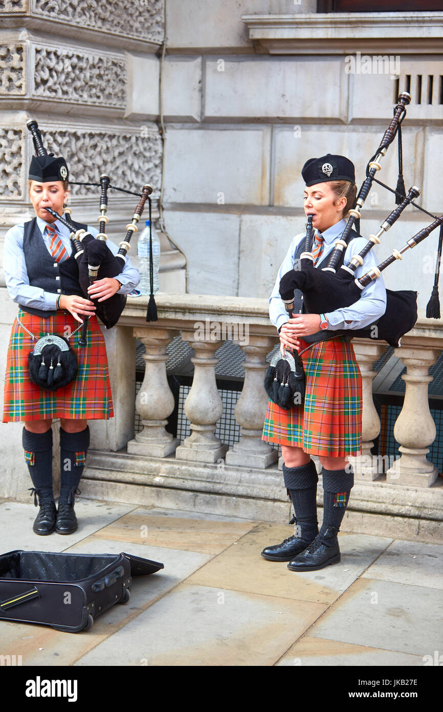 Women playing bagpipes in central London Stock Photo Alamy