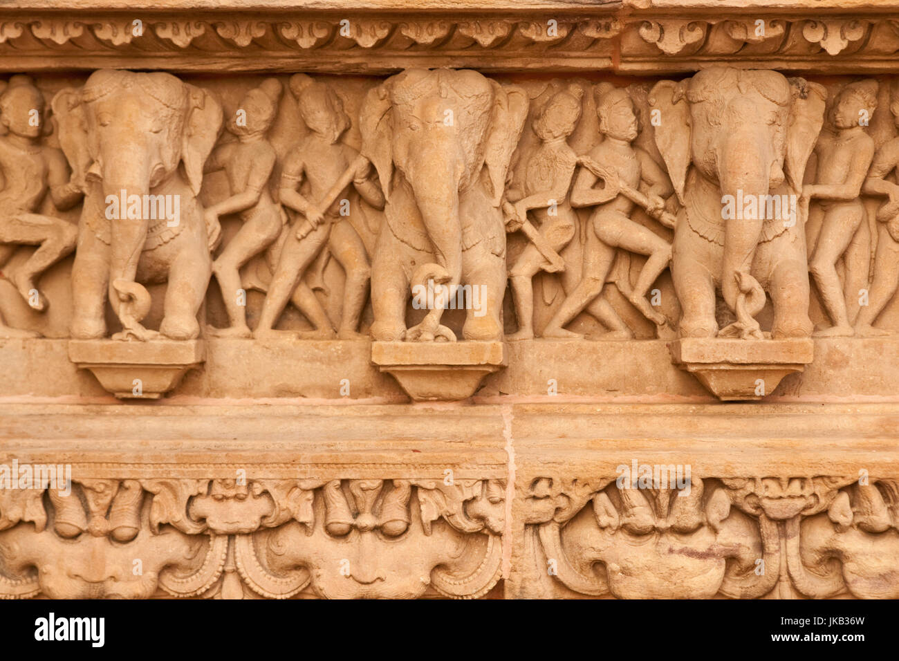 Carved elephants decorating the ancient Lakshmana Hindu Temple at Khajuraho, Madhya Pradesh, India. 10th Century AD. Stock Photo