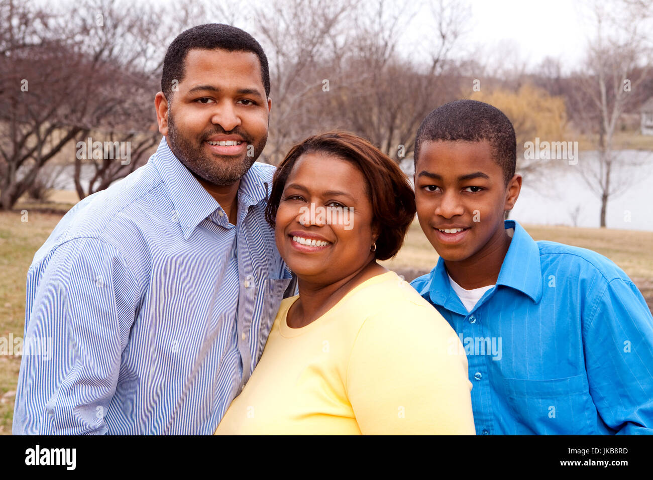 Happy African American Family Smiling Outside Stock Photo - Alamy