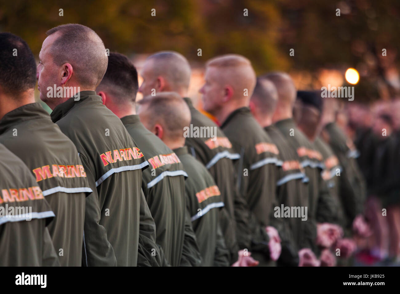 USA, Virginia, Arlington, US Marines in running gear by the Iwo Jima Memorial Stock Photo