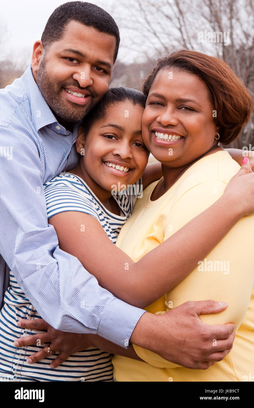 Happy African American Family Smiling Outside Stock Photo - Alamy