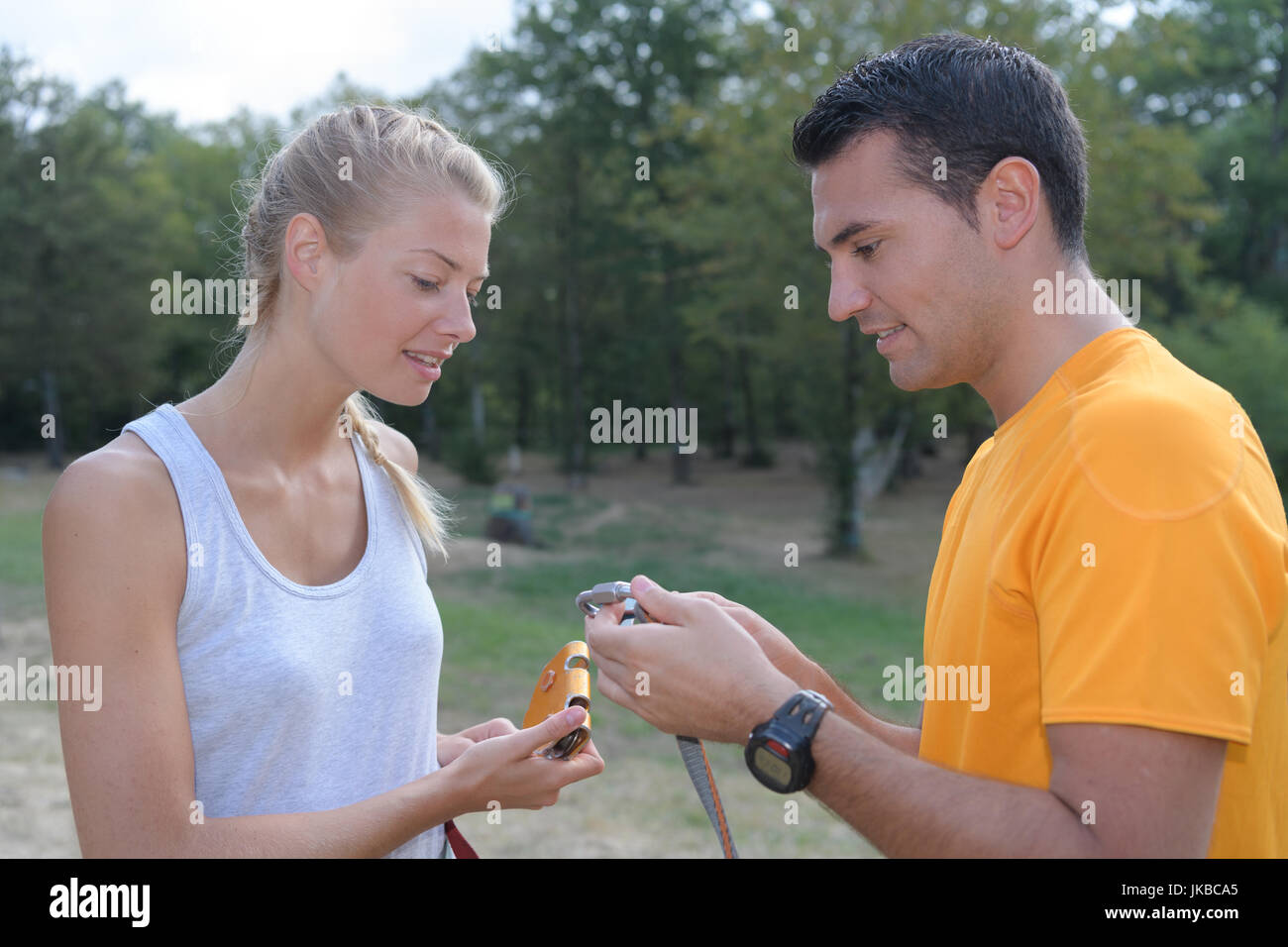 sports coach with woman training toutdoor Stock Photo