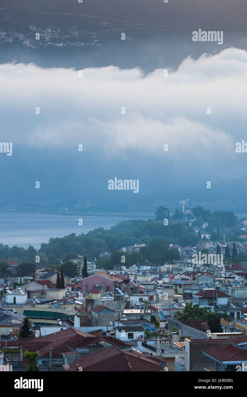 Greece, Epirus Region, Ioannina, elevated city view over Lake Pamvotis, dawn Stock Photo