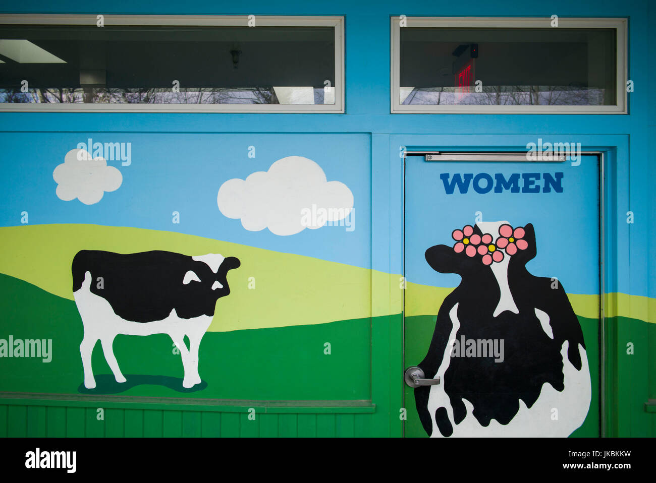 USA, Vermont, Waterbury, Ben & Jerry's Ice Cream World, cow-themed Women' room Bathroom door Stock Photo