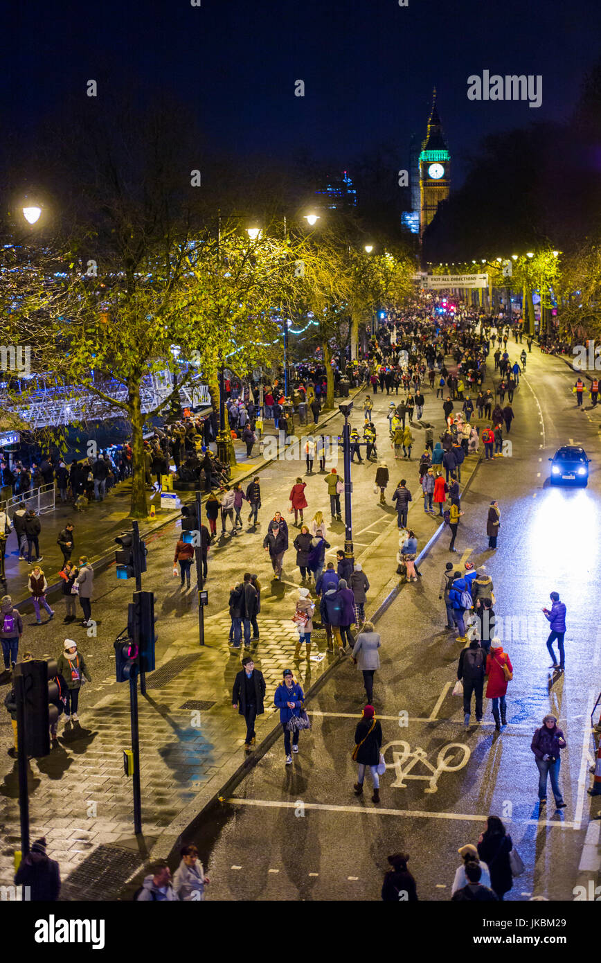 England, London, Victoria Embankment, New Years Eve crowds with Big Ben, evening Stock Photo