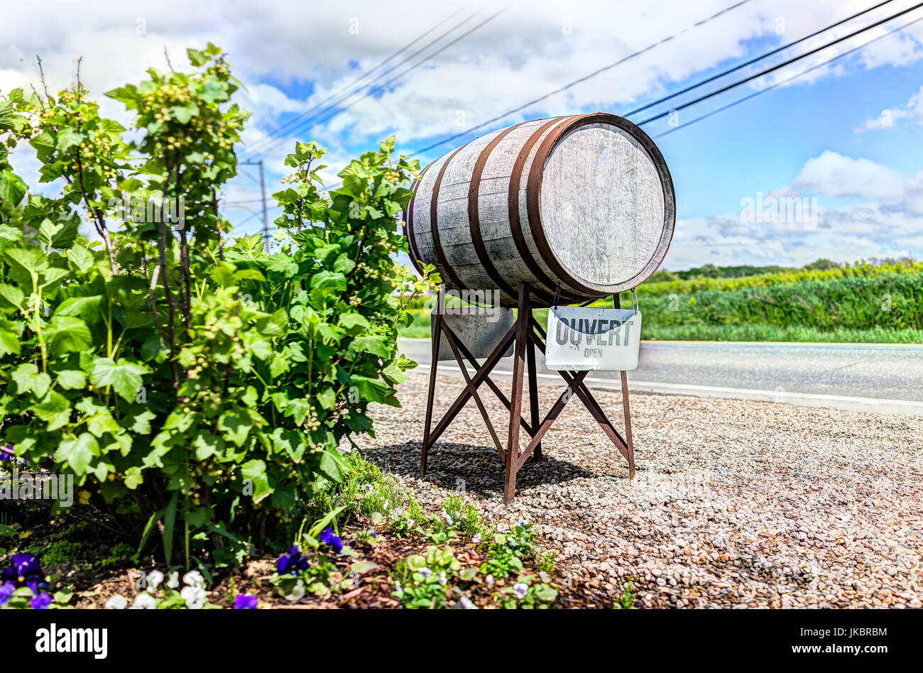 Wine barrel sign in French countryside with ouvert open sign by road Stock Photo