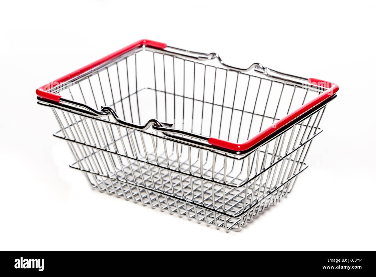 tiny metal shopping basket against white background Stock Photo