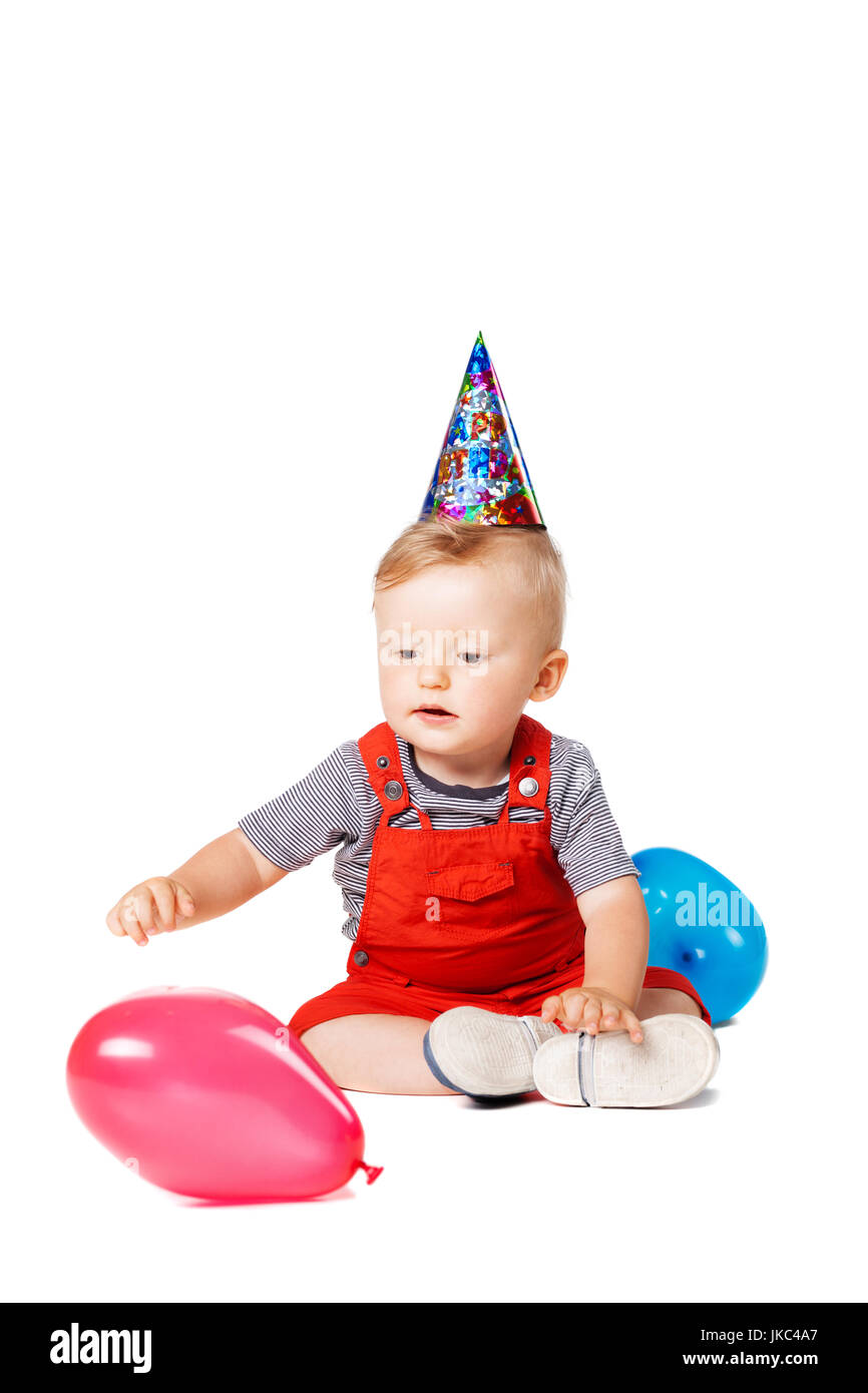 baby boy with birthday hat and balloons Stock Photo - Alamy