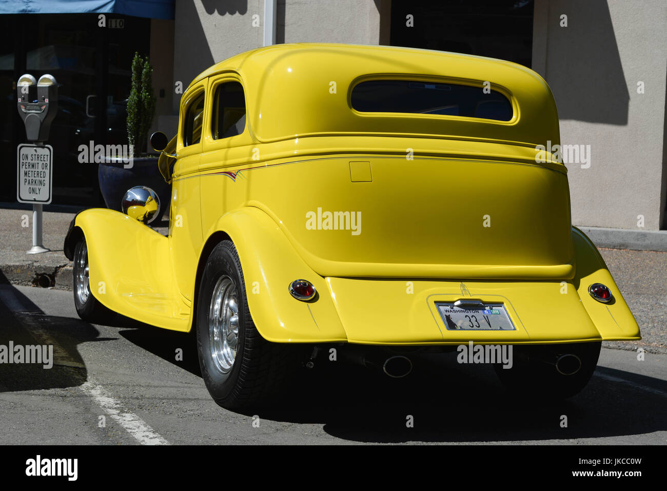 Yellow Vintage Car Stock Photo