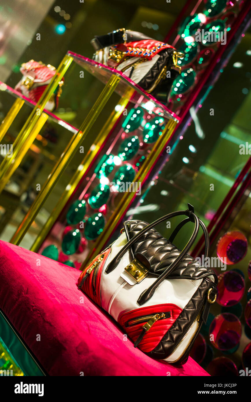 Milan, Italy - February, 25, 2022: woman wears pink Miu Miu Wander  Matelasse hobo bag in regenerated nylon Stock Photo - Alamy