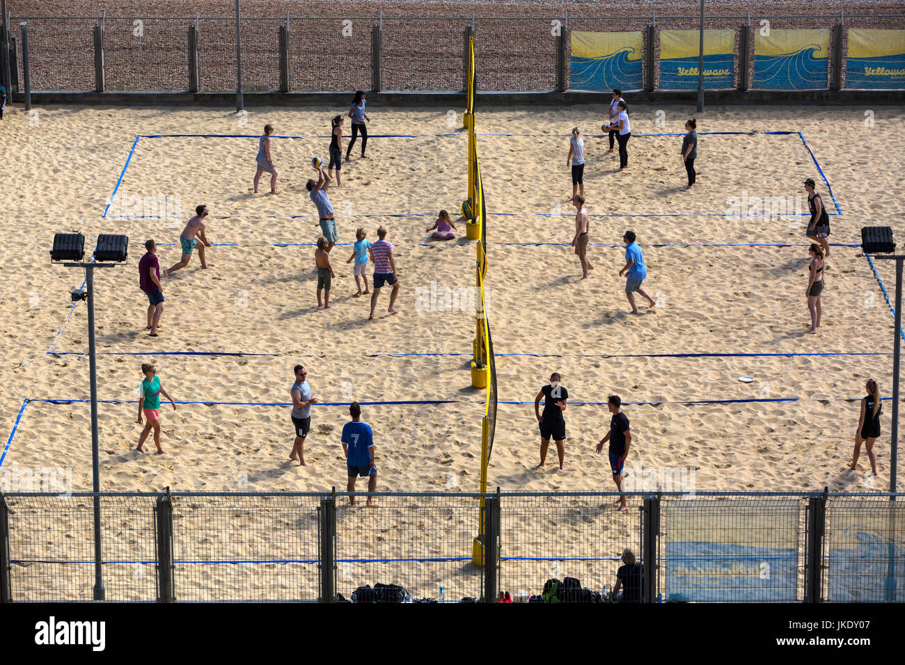 Beach Volleyball being played on the beach in Brighton, England. Stock Photo