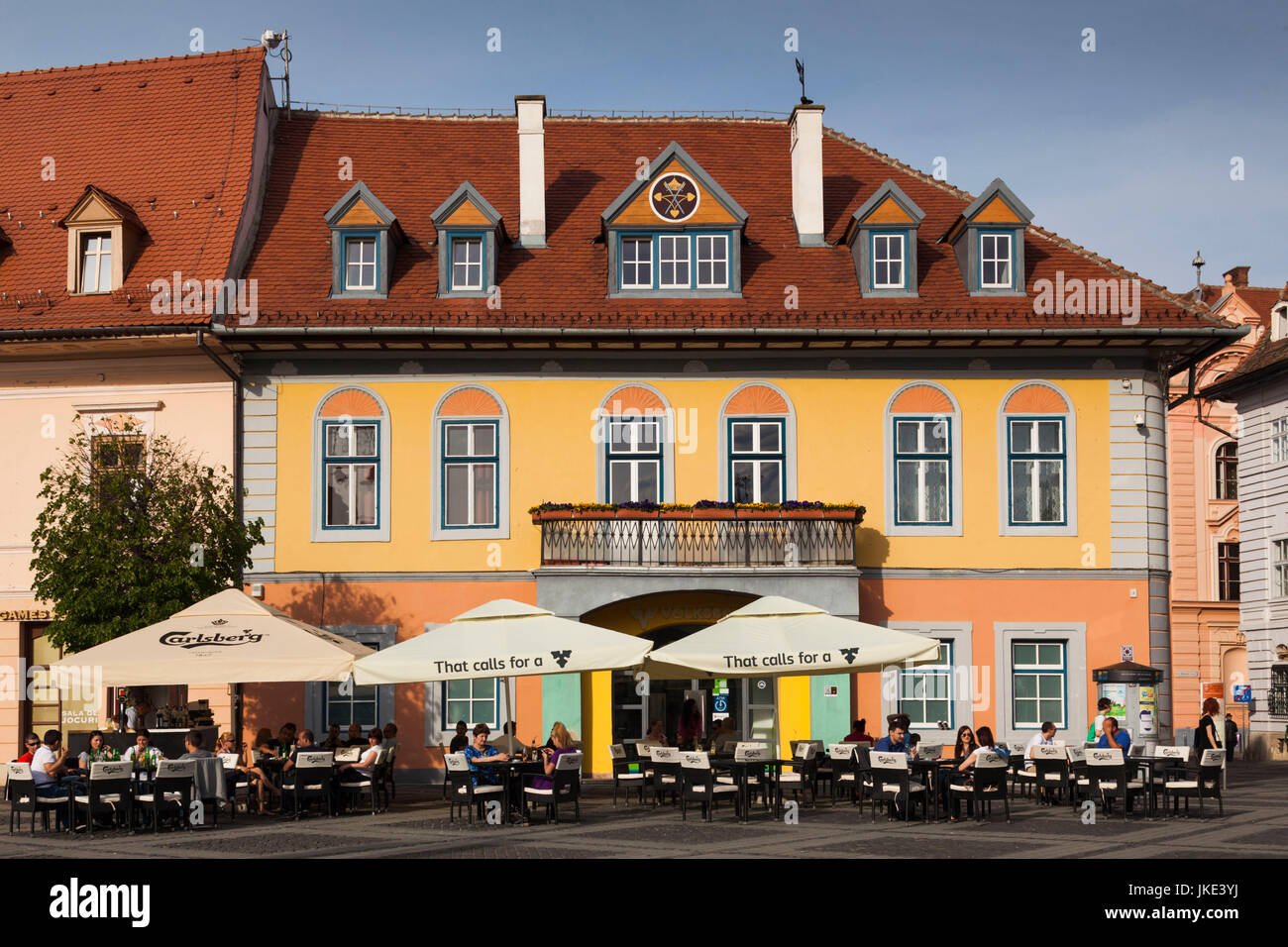 Romania, Transylvania, Sibiu, Piata Mare Square, outdoor cafe Stock