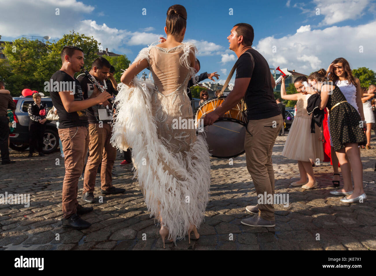 Bulgaria, Sofia, Ploshtad Alexander Nevski Square, Bulgarian students celebrating high school graduation, dancing to Roma-Gypsy bands, NR Stock Photo