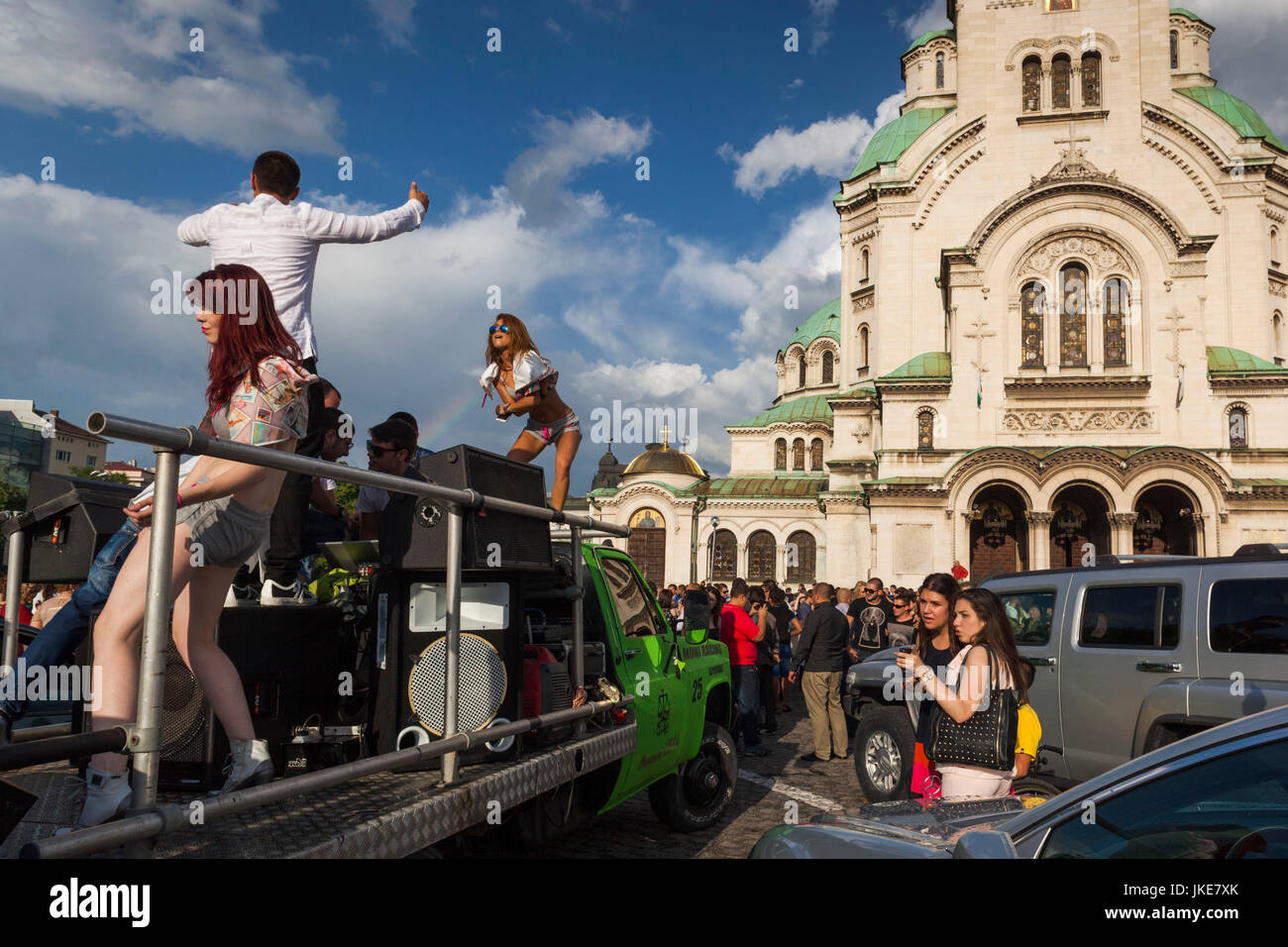 Bulgaria, Sofia, Ploshtad Alexander Nevski Square, Bulgarian students celebrating high school graduation, go-go dancers atop the party dance truck, NR Stock Photo
