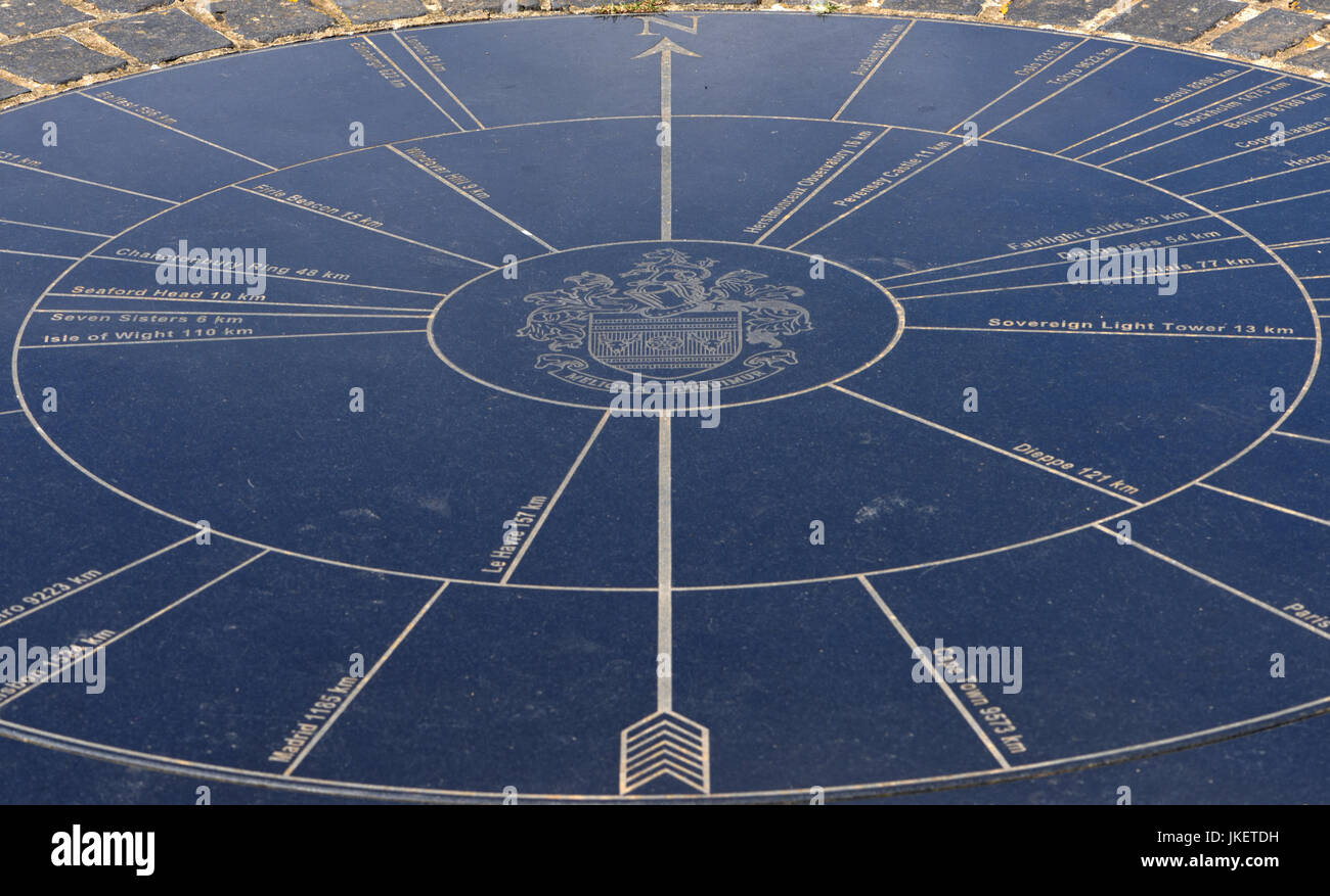 A compass rose on the top of Beachy Head showing the directions to