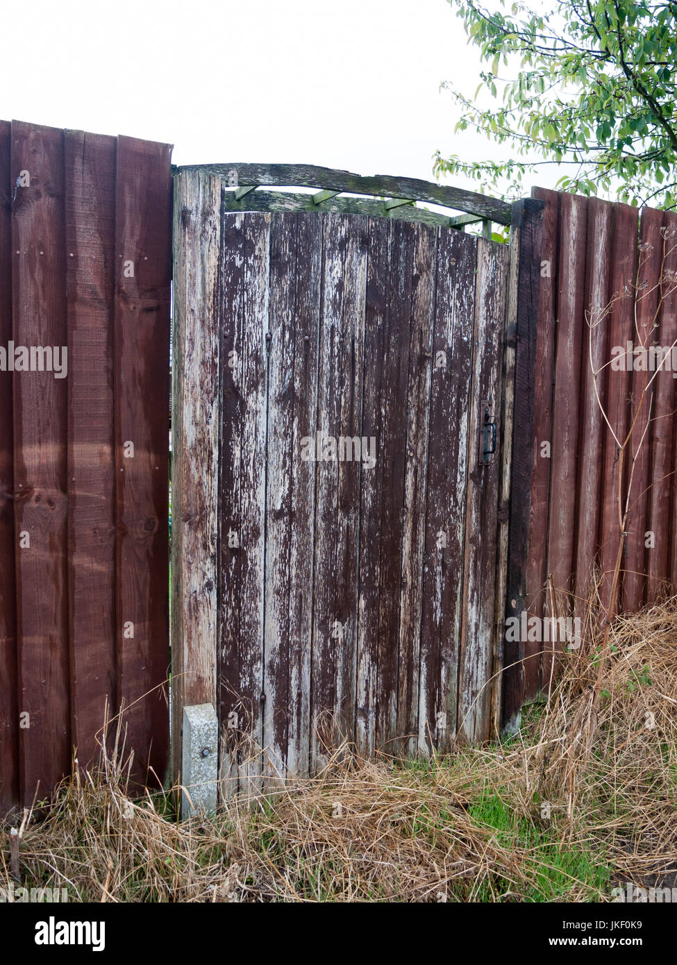 old and rustic wood garden gate and fence; Essex; UK Stock Photo Alamy