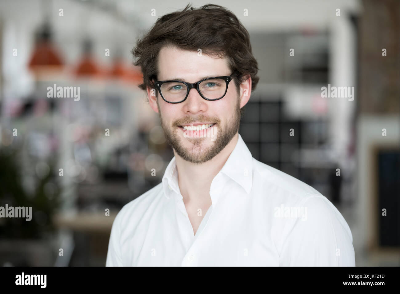 Young businessman wearing glasses, portrait Stock Photo