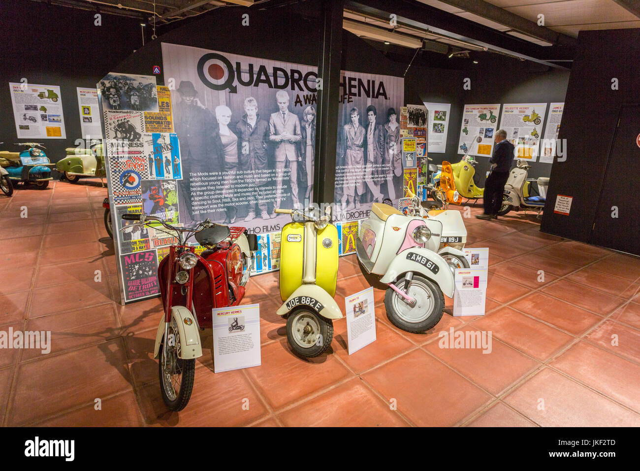 A display of vintage British motor scooters in the Haynes International